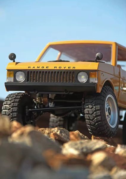Машинка на радіокеруванні Range Rover, масштаб 1:12, з пониженою передачею та підсвіткою,коричневий 9979 фото